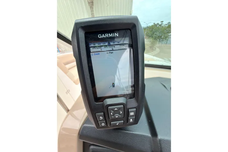 Slide: The Image of Garmin GPS device on 2012 Chaparral 216 SSi boat dashboard. - 29