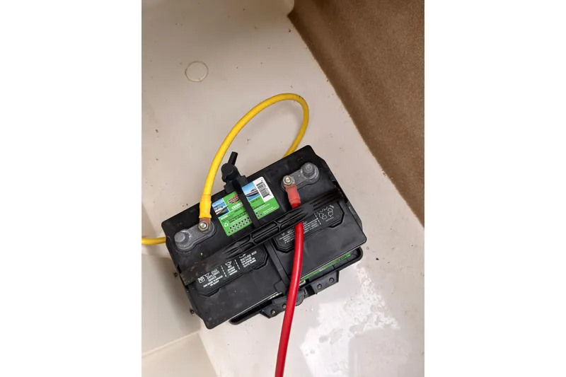 Slide: The Image of Battery with red and yellow cables in 2012 Chaparral 216 SSi boat. - 38