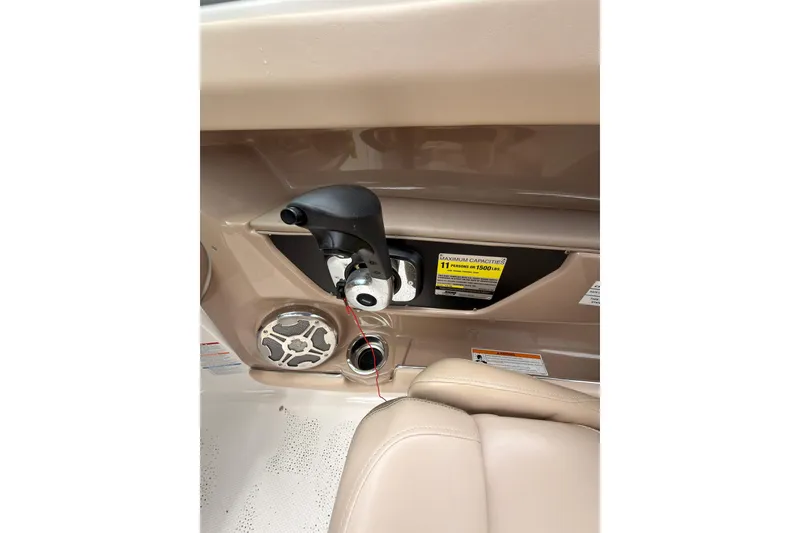 Slide: The Image of Interior view of 2012 Chaparral 216 SSi boat controls and speaker system. - 18
