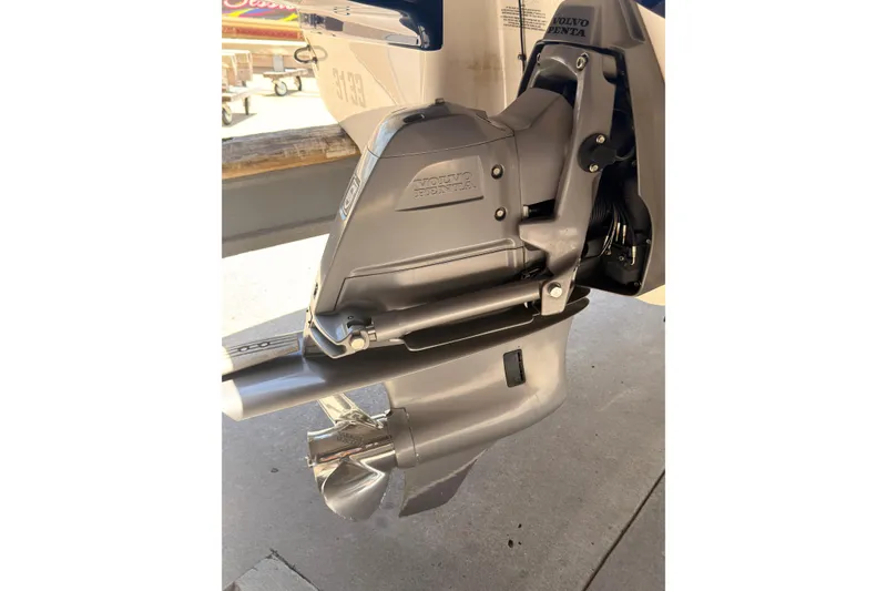 Slide: The Image of 2012 Chaparral 216 SSi boat with Volvo Penta outdrive, showcasing marine engineering. - 35