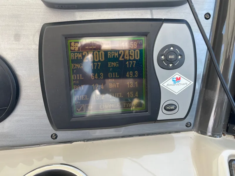 Slide: The Image of A SmartCraft display on a boat shows engine data and fuel consumption. - 23