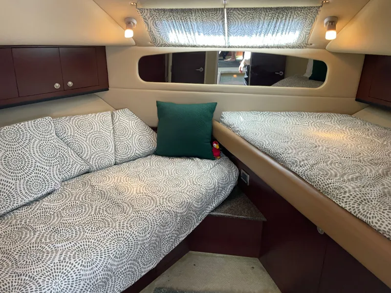 Slide: The Image of Interior of a Sea Ray 40MY yacht with cozy beds and elegant lighting. - 27