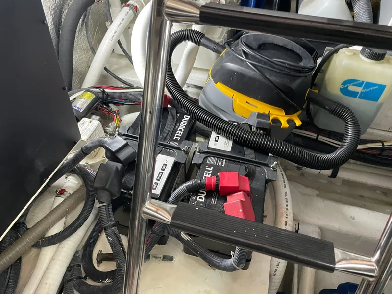 Slide: The Image of View of a Sea Ray 40MY engine room with batteries and cables. - 36