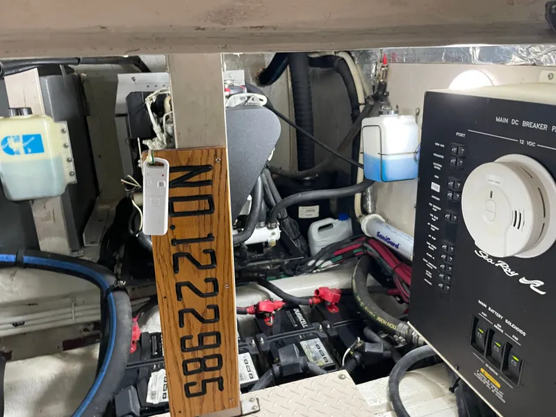 Slide: The Image of The engine room of a 2007 Sea Ray 40MY with control panel and batteries. - 39