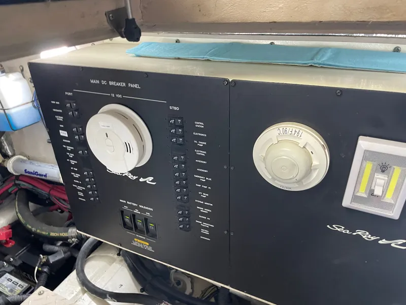 Slide: The Image of Electrical control panel in a boat engine room with switches and indicators. - 40