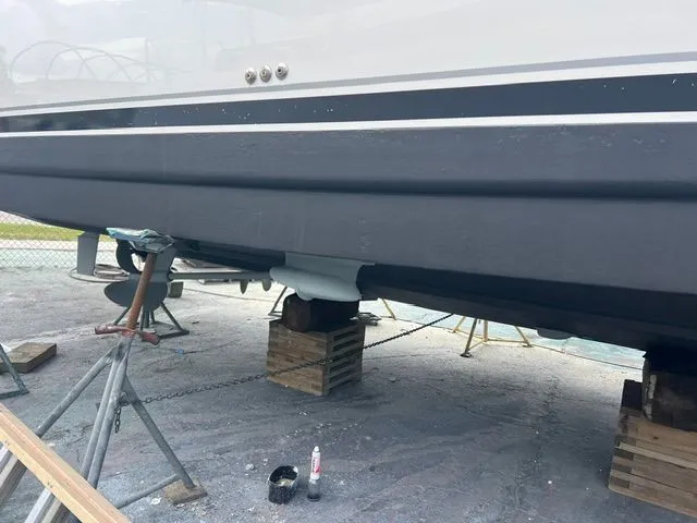 Slide: The Image of A 2007 Sea Ray 40MY boat is on a dry dock. - 47
