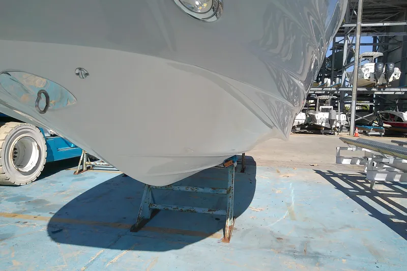Slide: The Image of 2017 Crownline Eclipse E6 XS boat on stand in marina storage area. - 10