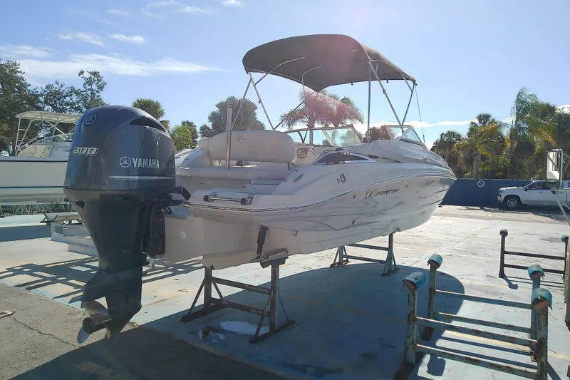 Slide: The Image of 2017 Crownline Eclipse E6 XS boat with Yamaha engine on display outdoors. - 15