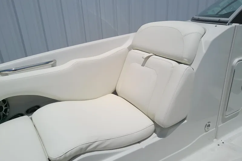 Slide: The Image of 2017 Crownline Eclipse E6 XS boat interior with white cushioned seating. - 31