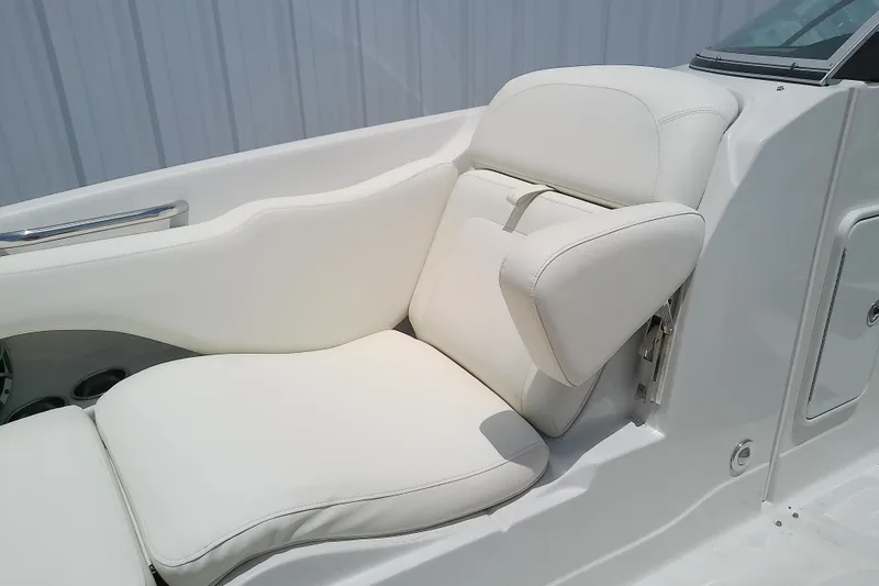 Slide: The Image of 2017 Crownline Eclipse E6 XS boat with luxurious white seating. - 32