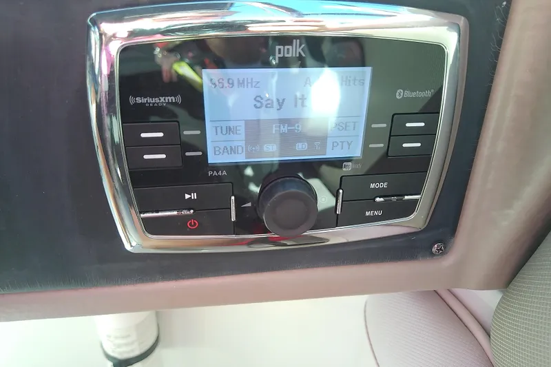 Slide: The Image of Polk audio system in 2017 Crownline Eclipse E6 XS boat, featuring SiriusXM and Bluetooth connectivity. - 44