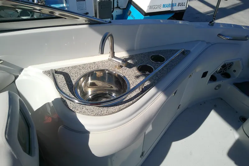 Slide: The Image of 2017 Crownline Eclipse E6 XS boat interior with sink and countertop. - 48