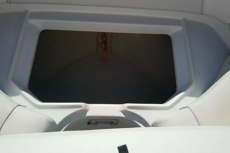 Slide: The Image of 2017 Crownline Eclipse E6 XS boat interior storage compartment. - 63