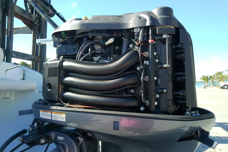 Slide: The Image of 2017 Crownline Eclipse E6 XS boat engine, detailed view, outdoors. - 64