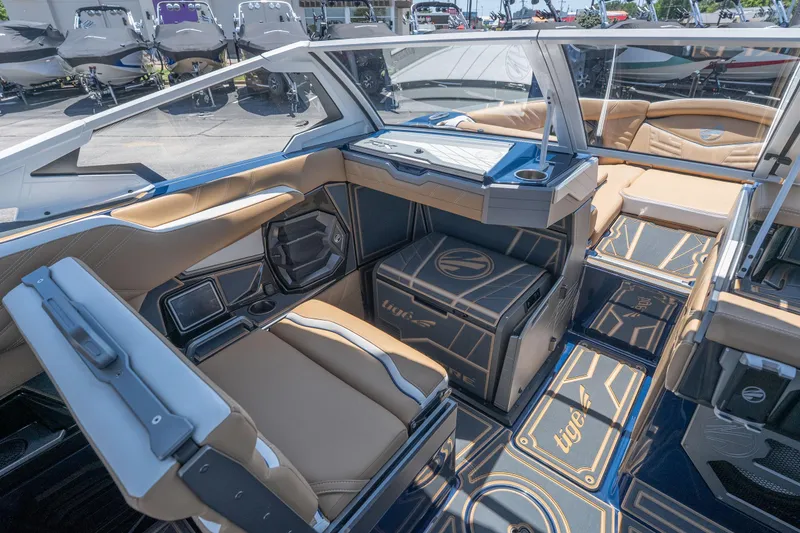 Slide: The Image of Interior of 2026 Tigé Ultré 23ZX boat with luxurious seating and modern design. - 11