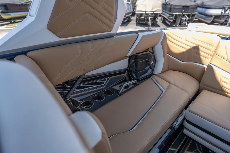 Slide: The Image of Luxurious interior of 2026 Tigé Ultré 23ZX boat with tan leather seating. - 15