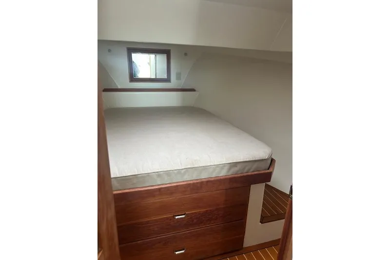 Slide: The Image of Compact cabin bed with wooden drawers and small window, Flowers model 43, 2016. - 20