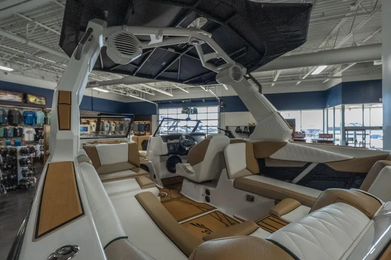 Slide: The Image of Interior of a 2026 Tigé Z3 boat, showcasing luxurious seating and modern design. - 13
