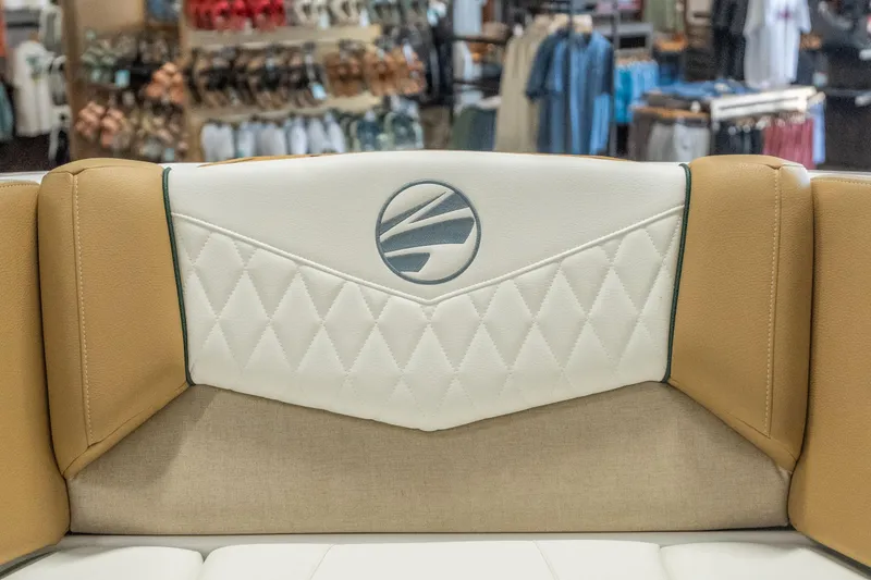 Slide: The Image of 2026 Tigé Z3 boat interior with tan and white diamond-stitched upholstery. - 20
