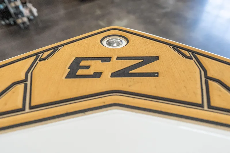 Slide: The Image of Close-up of 2026 Tigé Z3 boat deck with "EZ" logo and sleek design. - 21