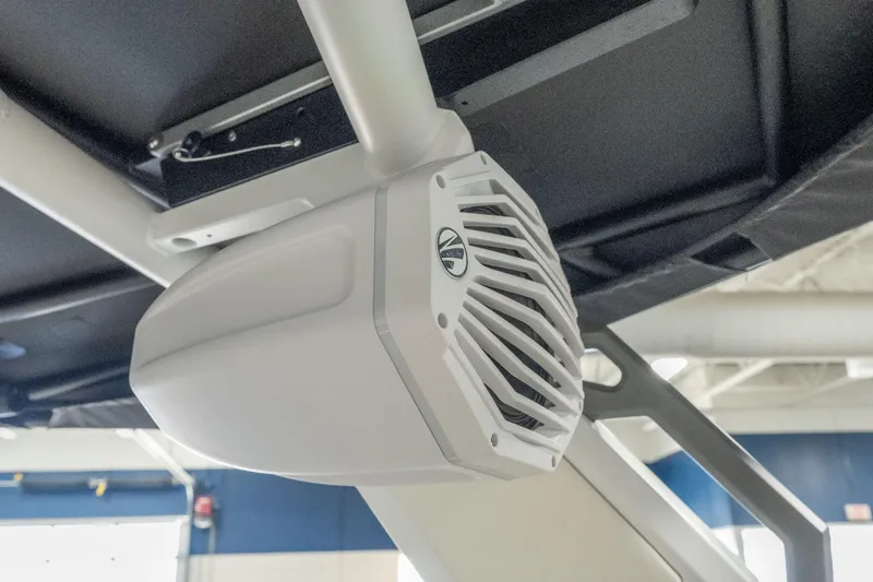 Slide: The Image of 2026 Tigé Z3 boat speaker system, mounted under a canopy, in a showroom setting. - 35