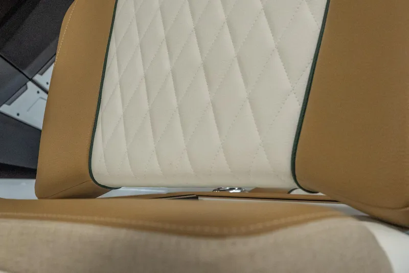 Slide: The Image of 2026 Tigé Z3 boat seat with diamond-stitched upholstery in tan and white. - 39