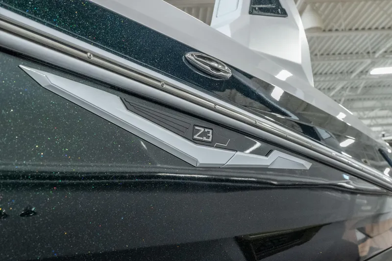 Slide: The Image of 2026 Tigé Z3 boat close-up, showcasing sleek design and metallic finish. - 5