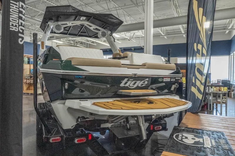 Slide: The Image of 2026 Tigé Z3 boat displayed indoors, showcasing sleek design and modern features. - 8
