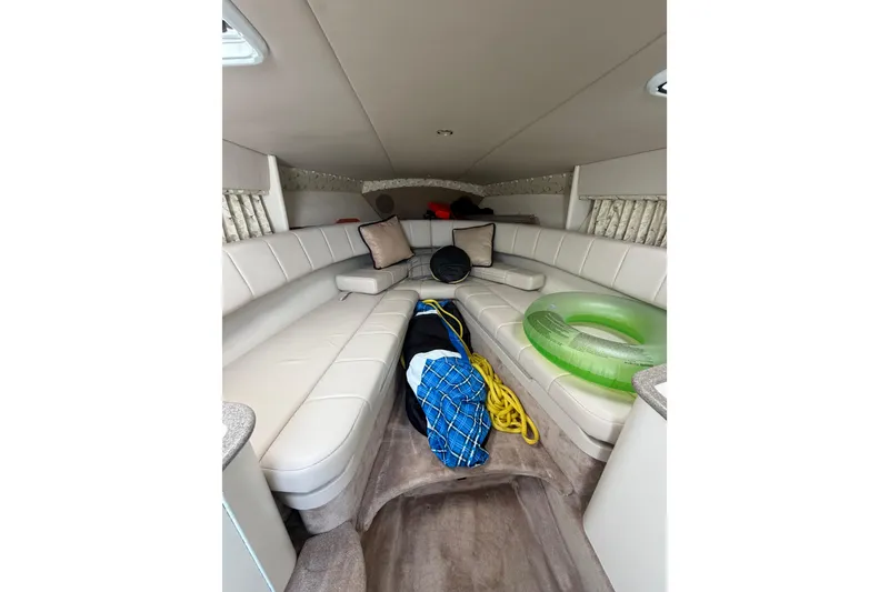 Slide: The Image of Interior of a 2000 Formula 330 Sun Sport boat with seating and accessories. - 20