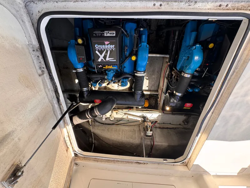Slide: The Image of View of the engine compartment of a 1998 Silverton 351 Sedan with Crusader XL engines. - 23