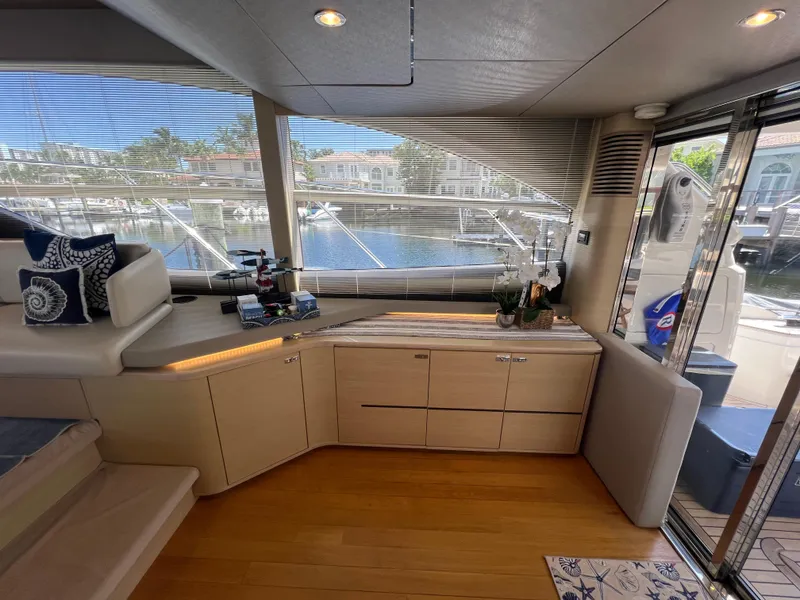 Slide: The Image of Luxurious interior of 2018 Princess F55 yacht with modern furnishings and marina view. - 11