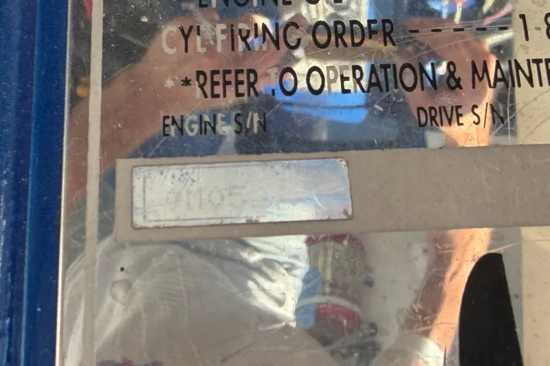 Slide: The Image of Close-up of a 2002 Cigarette 35' Cafe Racer engine information plate. - 52