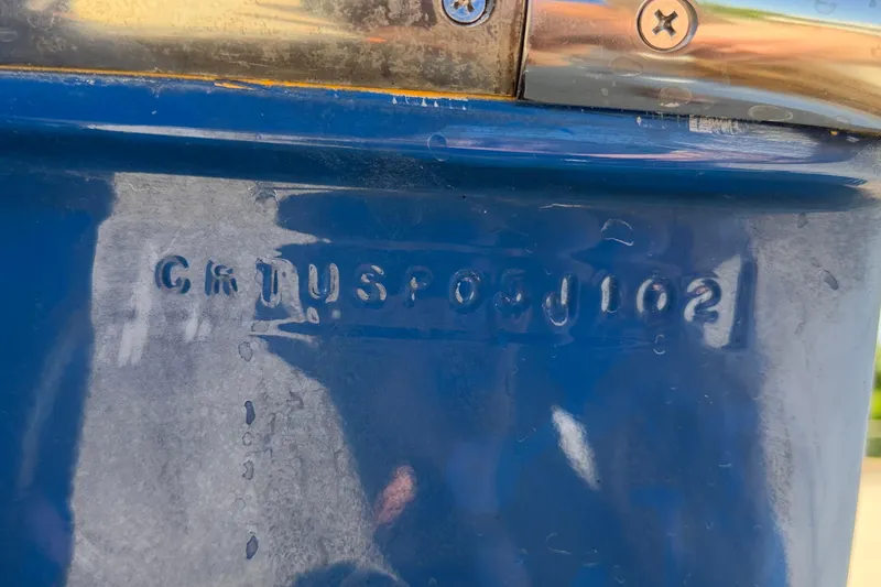 Slide: The Image of Hull identification number on a blue 2002 Cigarette 35' Cafe Racer boat. - 7