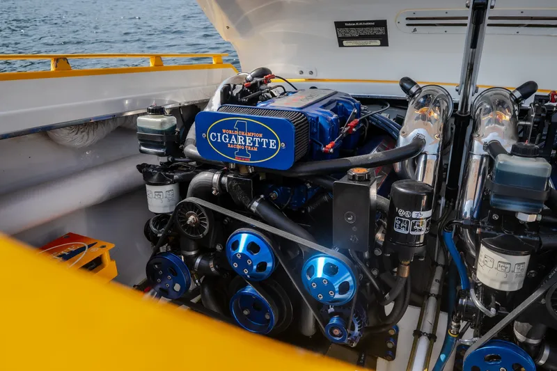 Slide: The Image of Engine of 2002 Cigarette 35' Playboy Edition boat, showcasing performance components. - 16