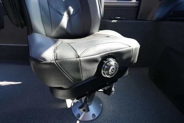 Slide: The Image of A padded boat seat with adjustable swivel mechanism on a sturdy pedestal. - 27