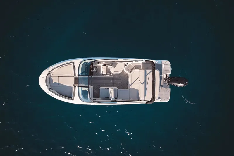 Slide: The Image of Aerial view of a 2027 Sea Ray SPX 210 Outboard on calm water. - 22