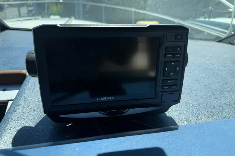 Slide: The Image of Garmin navigation device on 1987 Sea Ray 300 Weekender boat dashboard. - 7