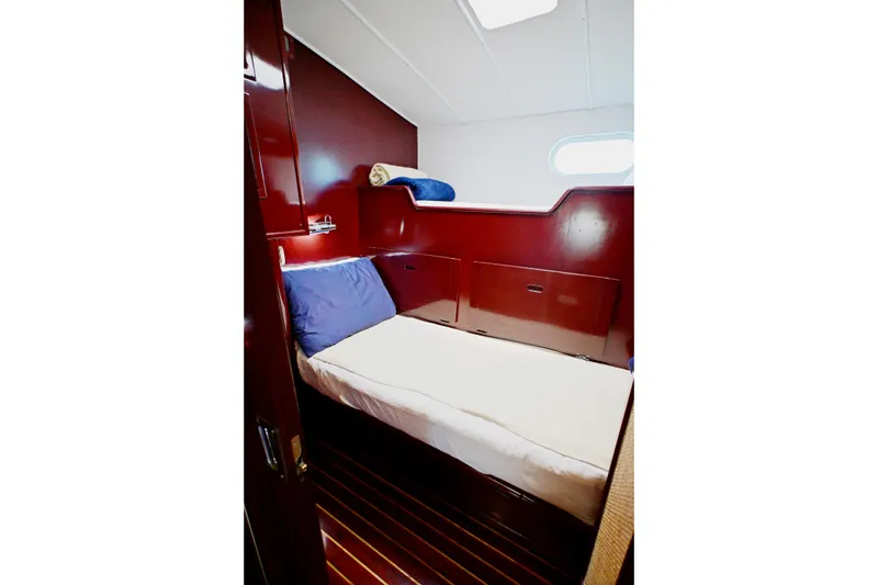 Slide: The Image of Cozy cabin interior of 1968 Abeking & Rasmussen Tripp 74 yacht with wooden finish. - 15