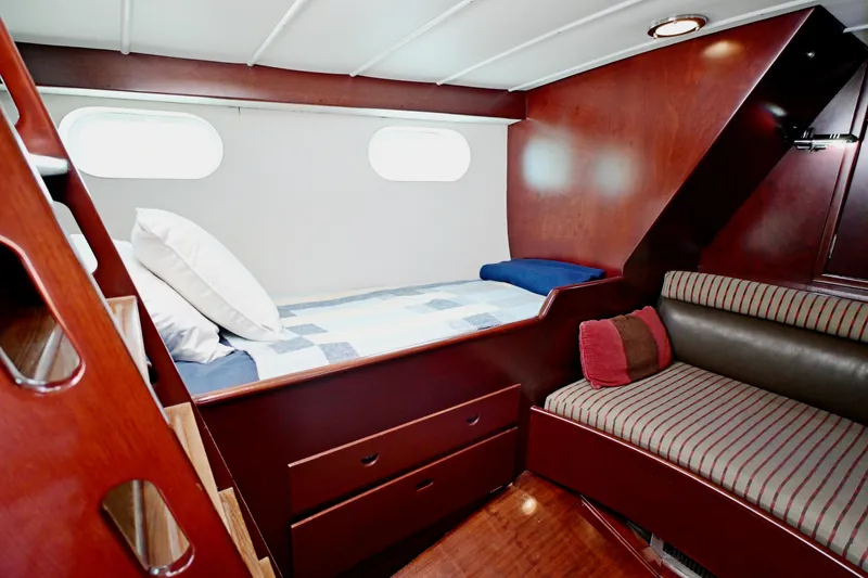 Slide: The Image of Cozy cabin interior of 1968 Abeking & Rasmussen Tripp 74 yacht with wooden furnishings. - 20