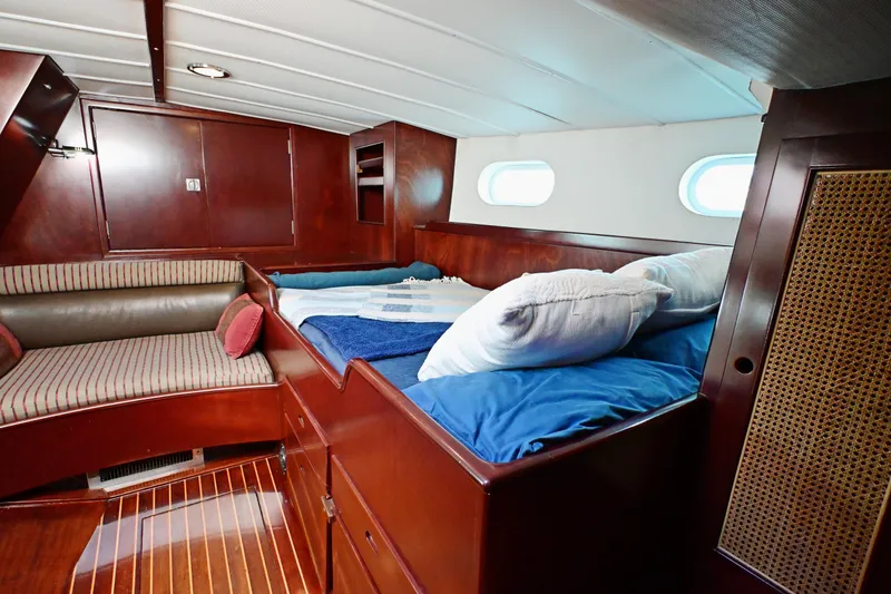 Slide: The Image of Luxurious cabin interior of 1968 Abeking & Rasmussen Tripp 74 yacht with wooden finishes. - 21