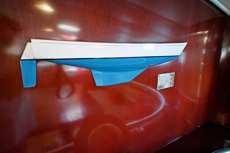 Slide: The Image of Model of Abeking & Rasmussen Tripp 74 yacht, 1968, displayed on wooden wall. - 25