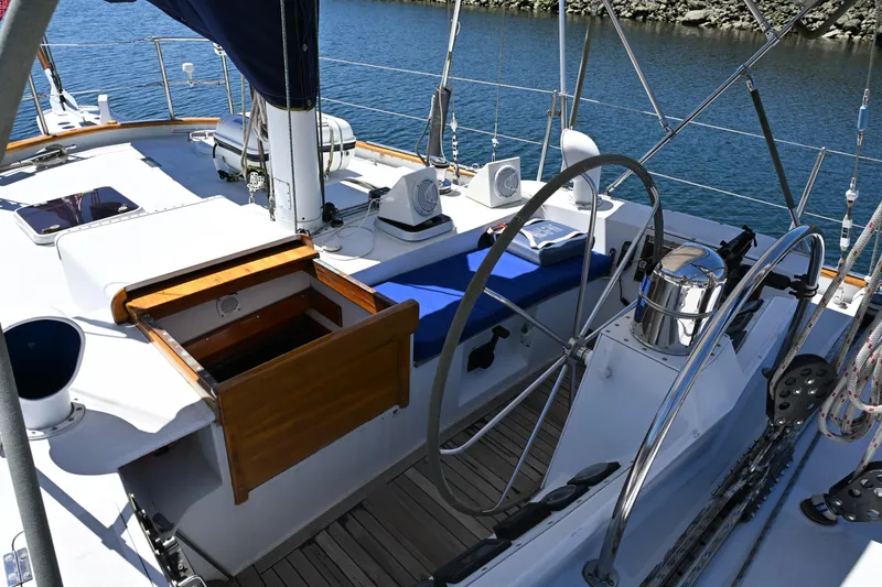 Slide: The Image of Cockpit of 1968 Abeking & Rasmussen Tripp 74 yacht with steering wheel and seating. - 30
