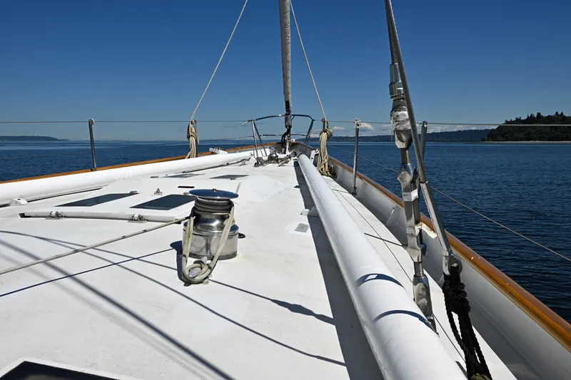 Slide: The Image of Sailing yacht deck view, Abeking & Rasmussen Tripp 74, 1968, on calm blue waters. - 37