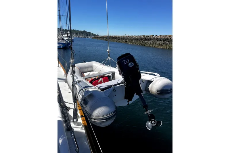 Slide: The Image of Inflatable dinghy with outboard motor on Abeking & Rasmussen Tripp 74 yacht, 1968 model. - 61