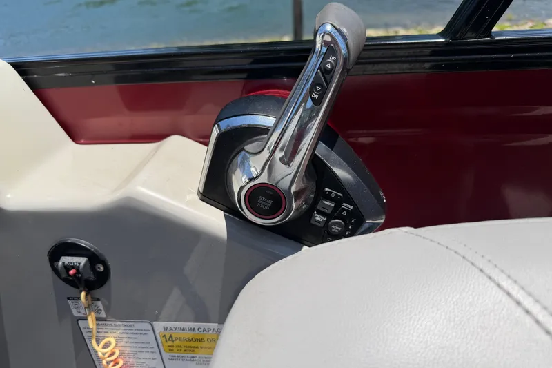 Slide: The Image of Throttle control of 2024 Regency R250DL3 boat, featuring start/stop button and control panel. - 25