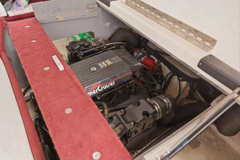 Slide: The Image of Engine compartment of a 1997 Sea Ray 230 Signature boat with MerCruiser engine. - 27