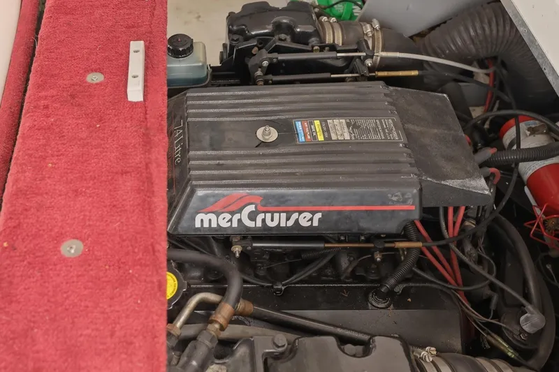 Slide: The Image of Engine of a 1997 Sea Ray 230 Signature boat. - 28