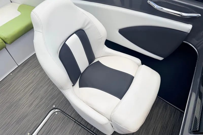 Slide: The Image of 2018 Glastron GT 185 boat interior with stylish white and black seating. - 39