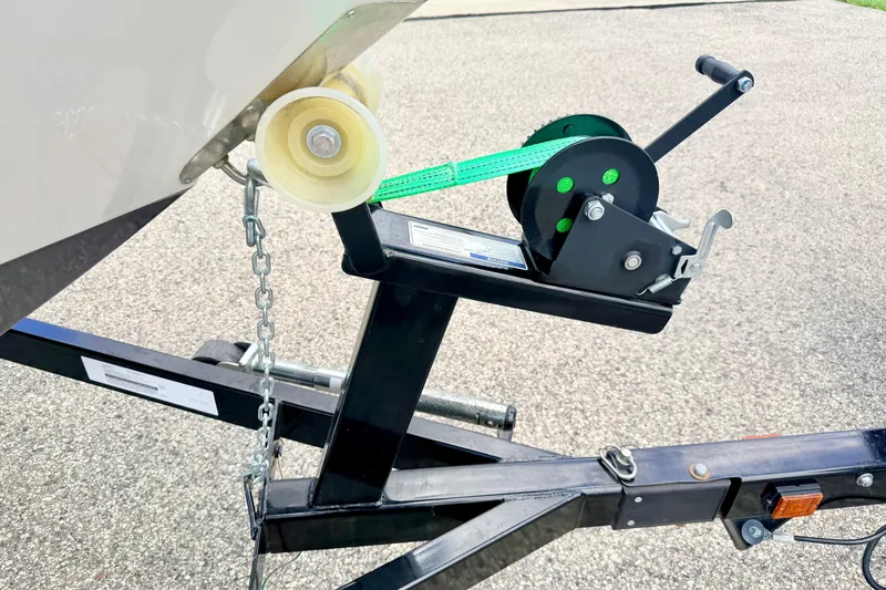 Slide: The Image of Trailer winch system for 2018 Glastron GT 185 boat, featuring a sturdy chain and strap. - 71