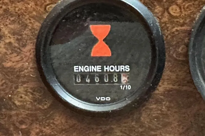 Slide: The Image of Engine hour meter showing 460.8 hours on 1985 Egg Harbor 33 Sedan. - 29